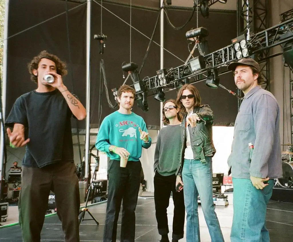 The Neighbourhood standing backstage